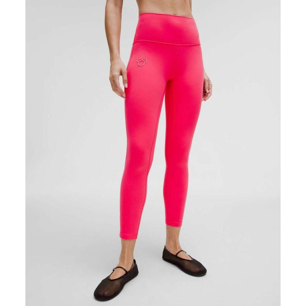 Disney x Lululemon Align High-Rise leggings in the vibrant "Lip Gloss" pink colo